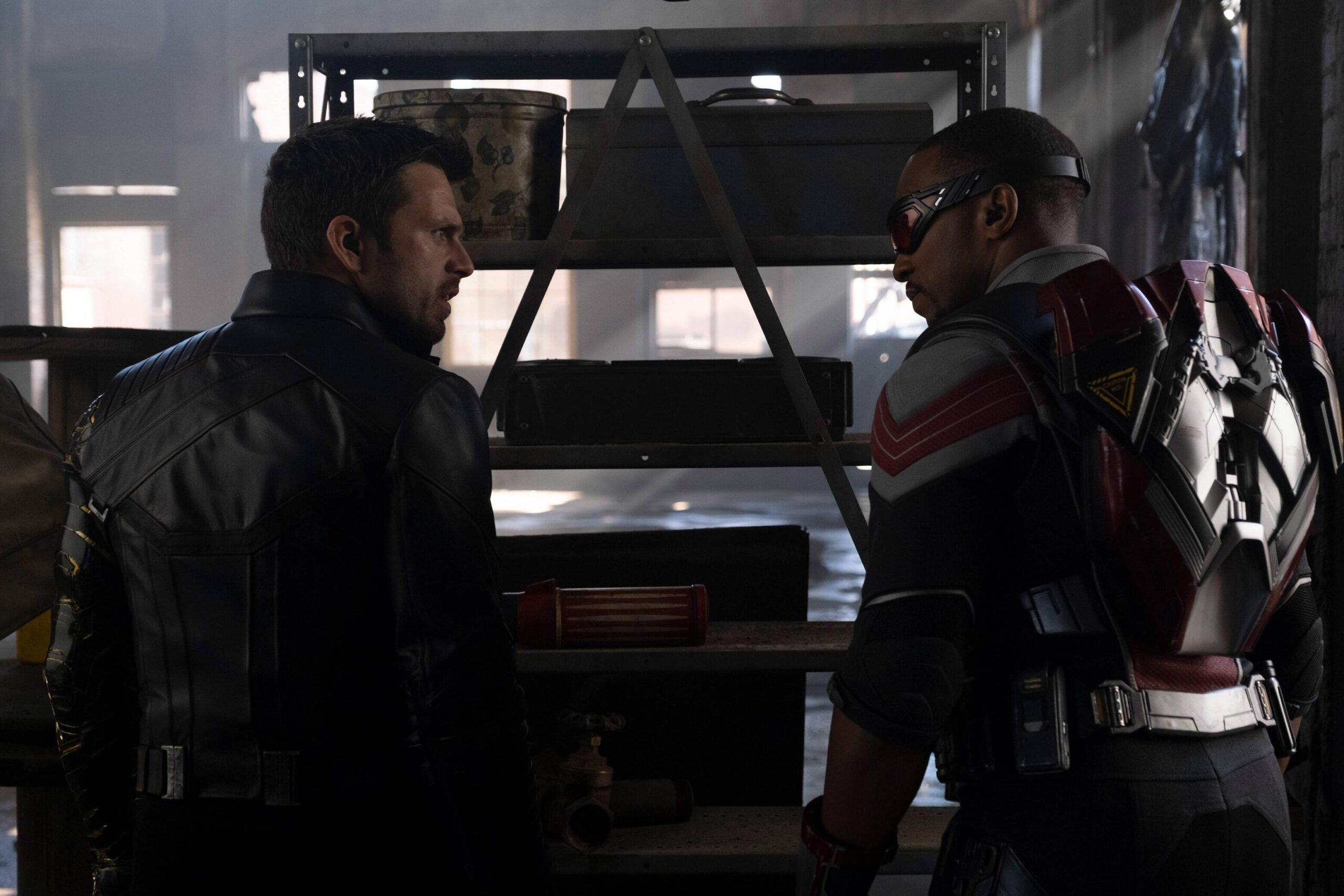 The Winter Soldier and The Falcon bickering in a warehouse.